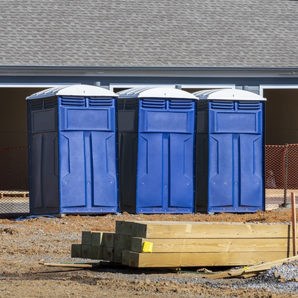 what is the cost difference between standard and deluxe portable toilet rentals in Spring Lake New Jersey